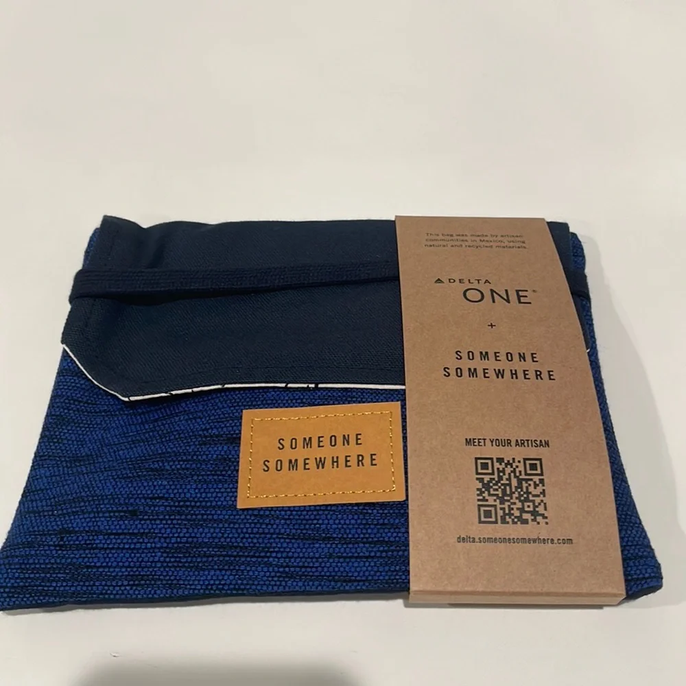 Delta One Someone Somewhere Artisan-Made Amenity Kit. Royal Blue. NWT